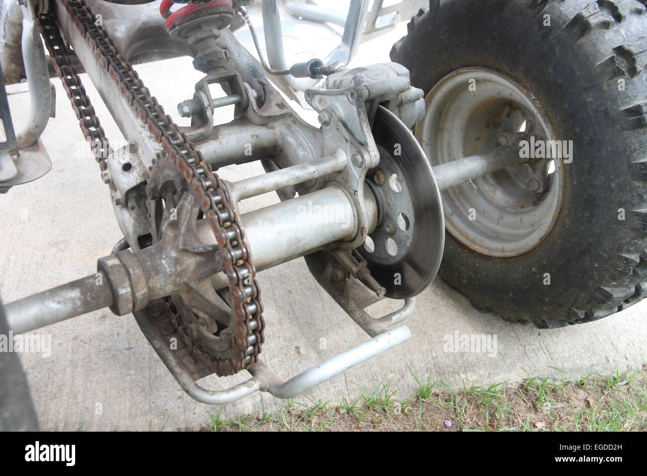 gear and chains system of wheel in ATV car. Stock Photo