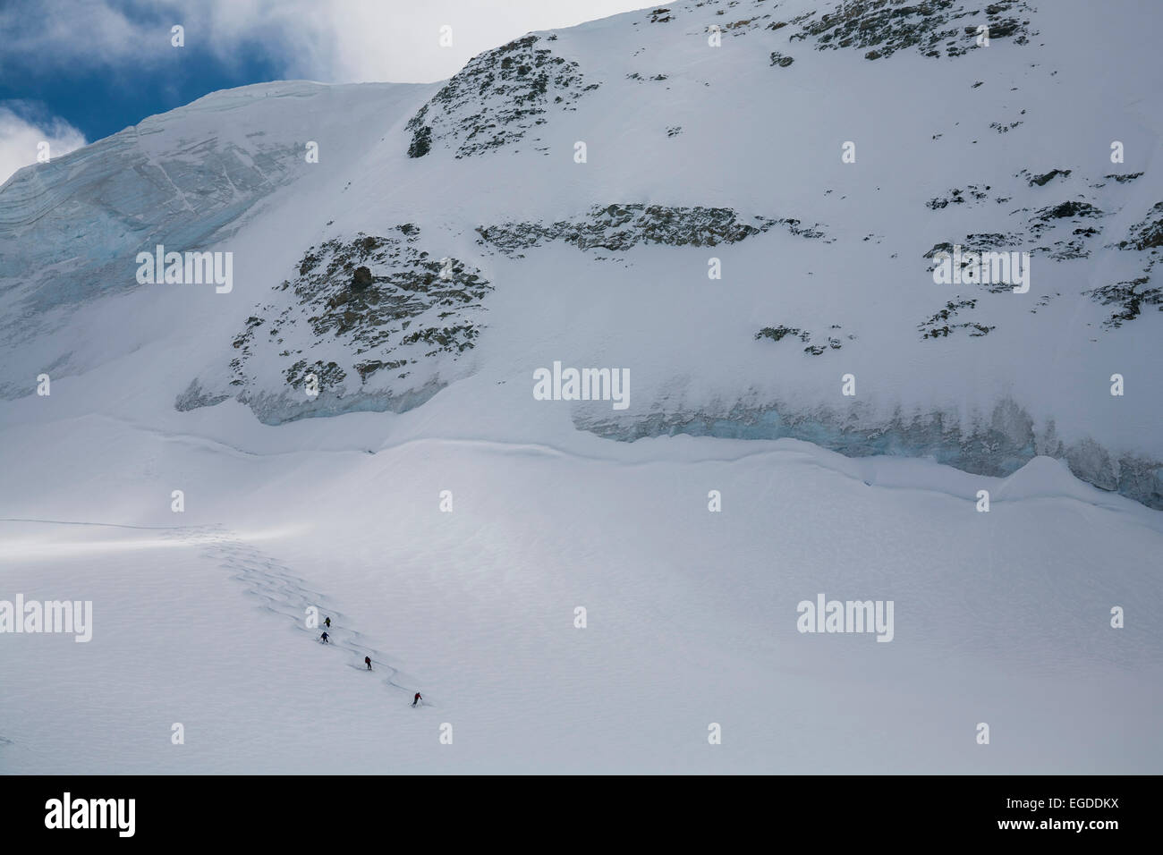Group of skier downhill skiing on glacier Durand to Val d Anniviers, Canton of Valais, Schwitzerland Stock Photo