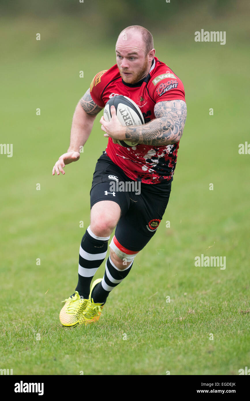 Rugby player running with ball Stock Photo Alamy