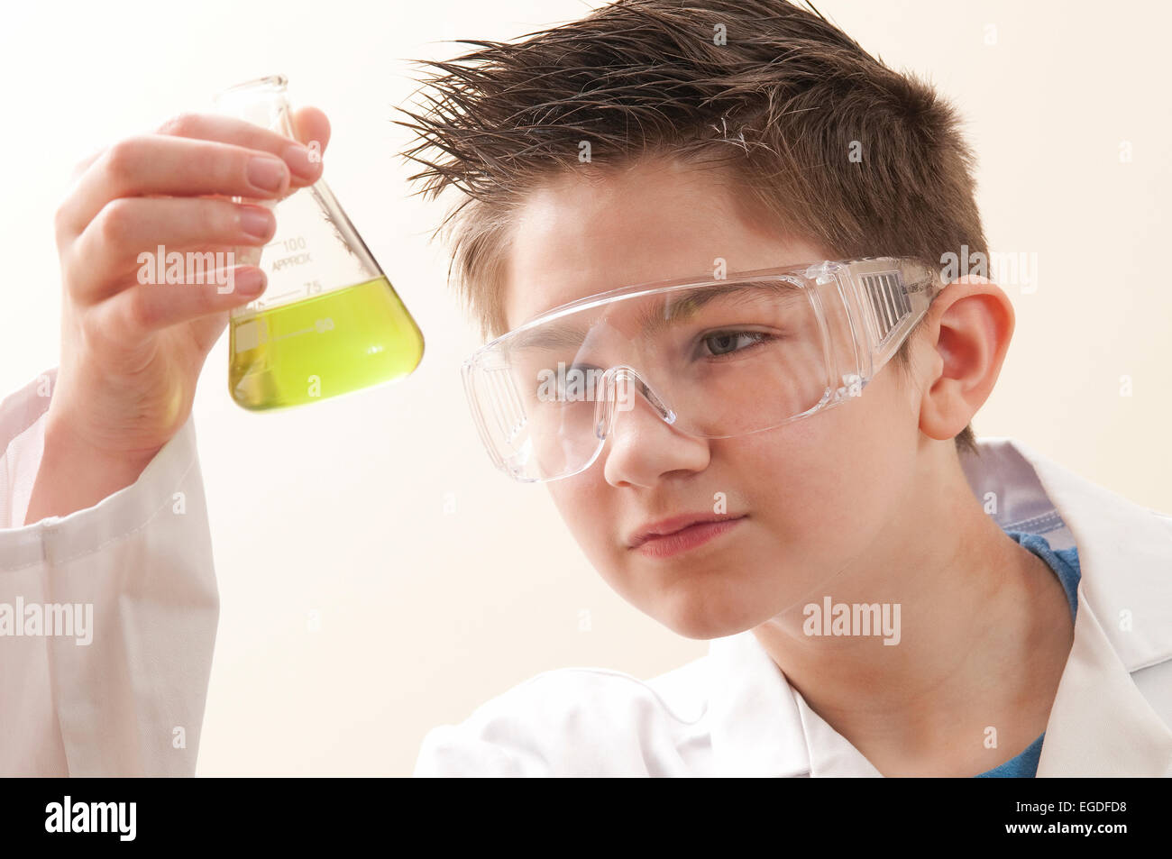 teenage school boy in chemistry lesson Stock Photo