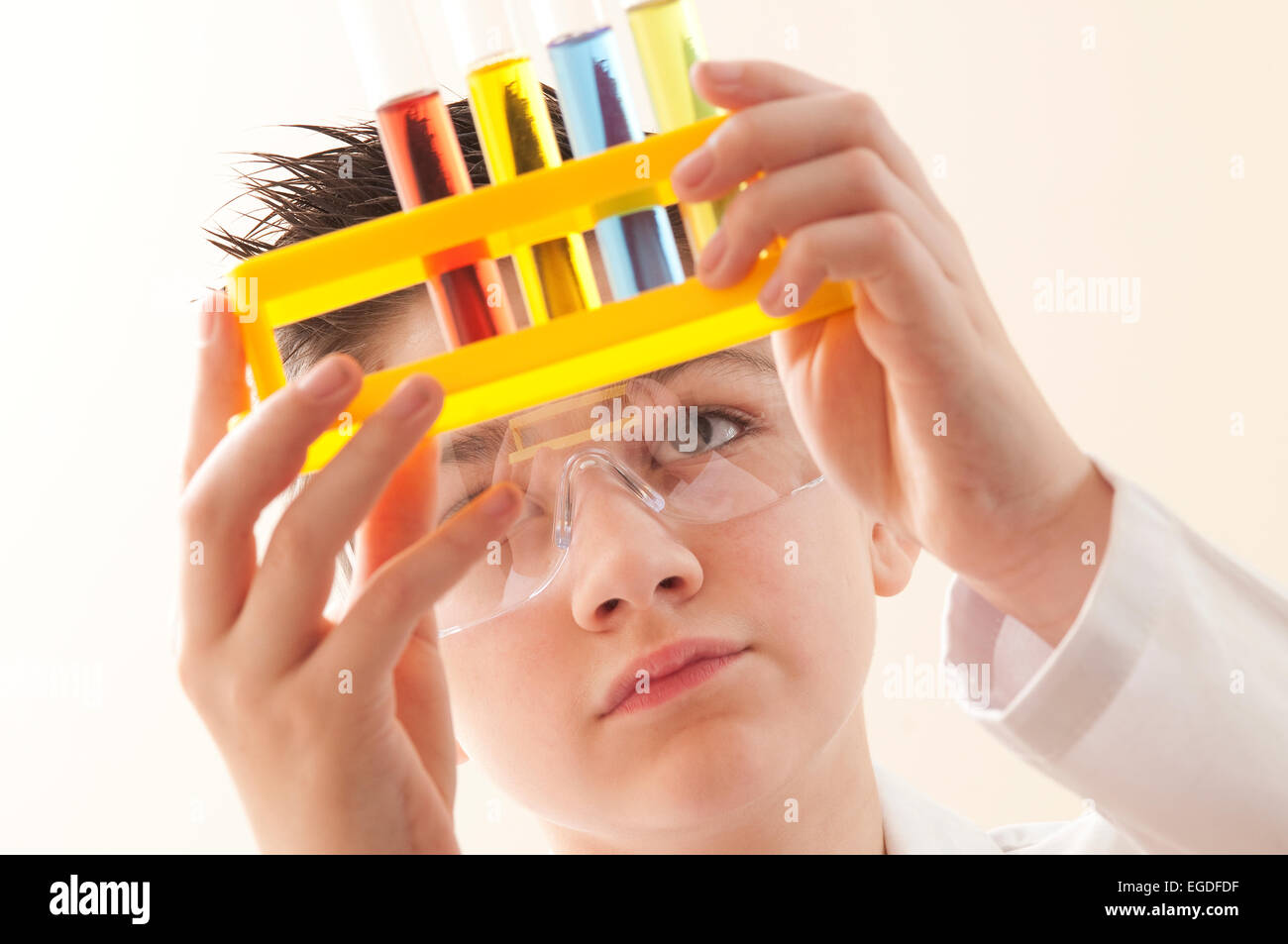 teenage school boy in chemistry lesson Stock Photo