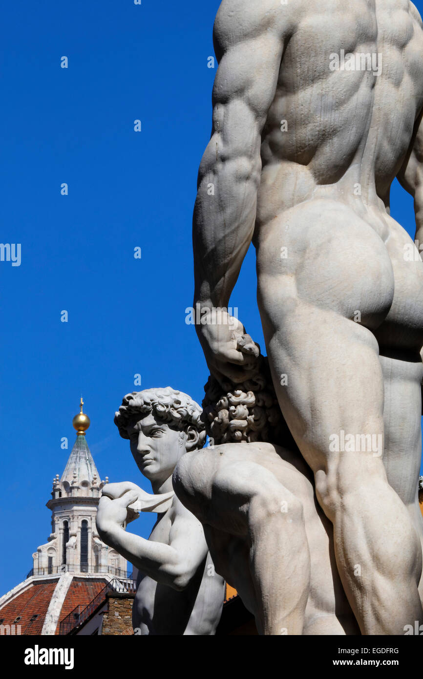 Sculpture of Hercules and David and the cupola of the dome, Piazza della Signoria, Florence, Tuscany, Italy Stock Photo