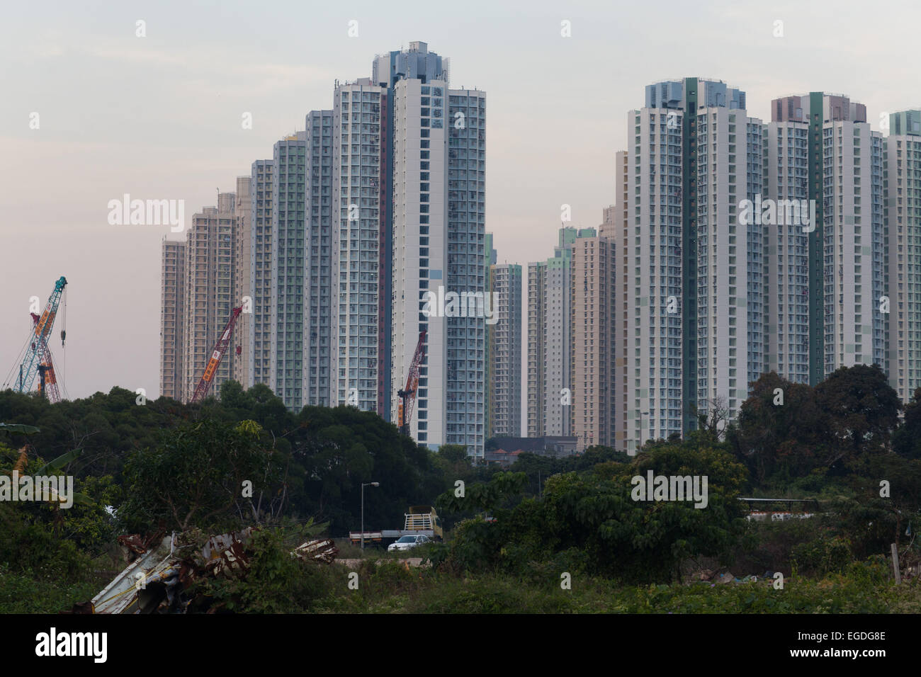 Tung Chung city is part of Hong Kong and is a giant cluster of tall tower blocks. 7 million people live on 1,104km square. Stock Photo