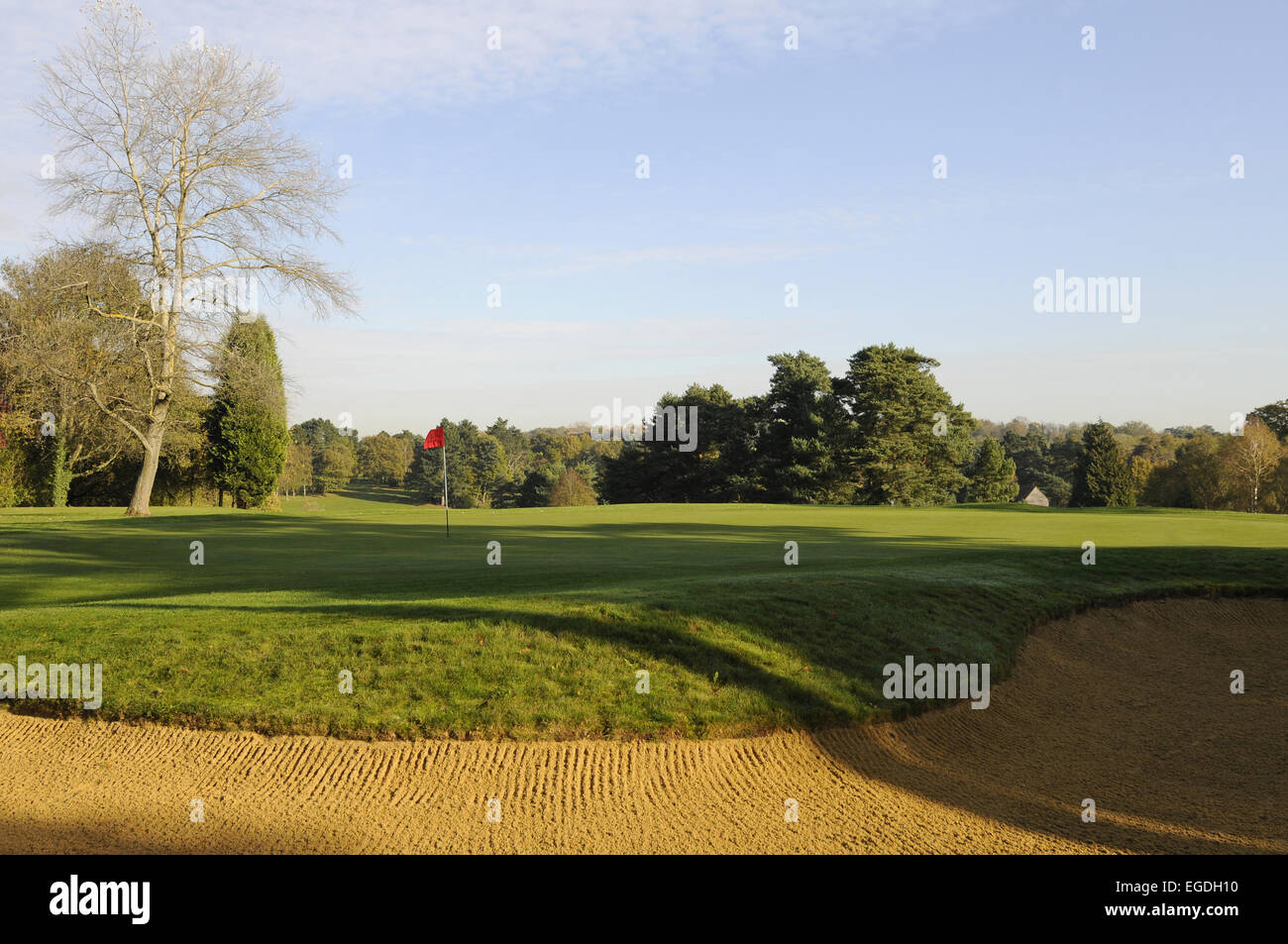 View over Bunker to 1st Green Porters Park Golf Club Radlett Hertfordshire England Stock Photo