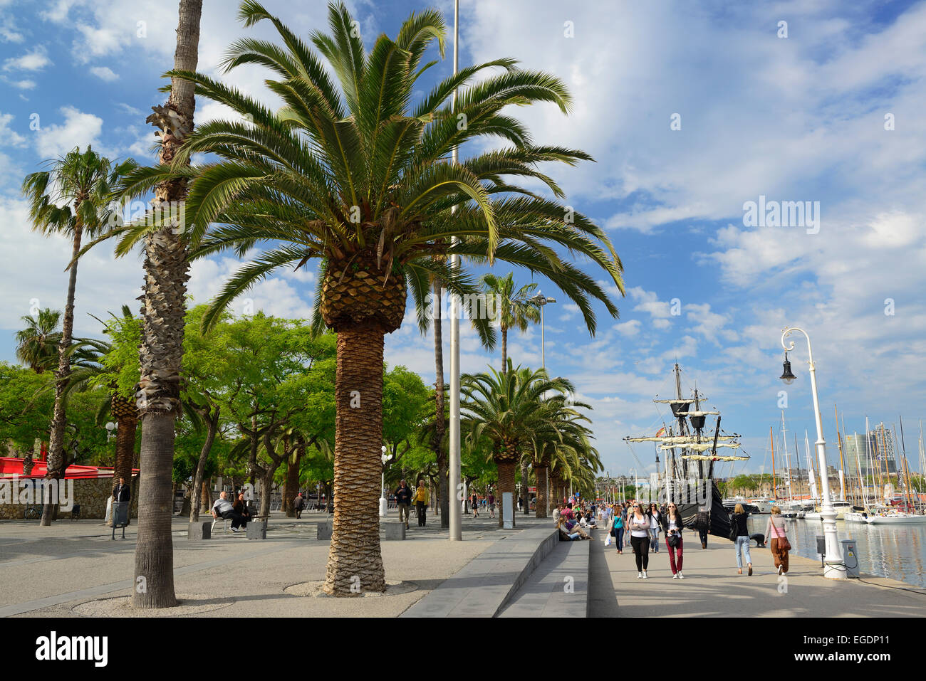 Seaside promenade with sailing ship in the Old Harbour, Port Vell, Barcelona, Catalonia, Spain Stock Photo