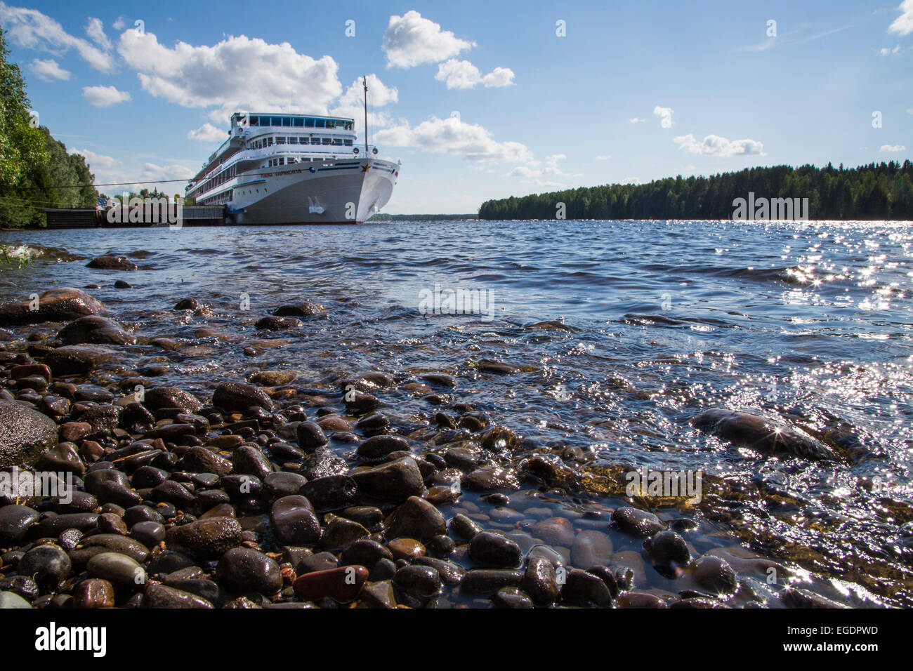 River cruise ship MS General Lavrinenkov (Orthodox Cruise Company) at the pier of the Mandrogi crafts village, Mandroga, Svir river, Russia, Europe Stock Photo