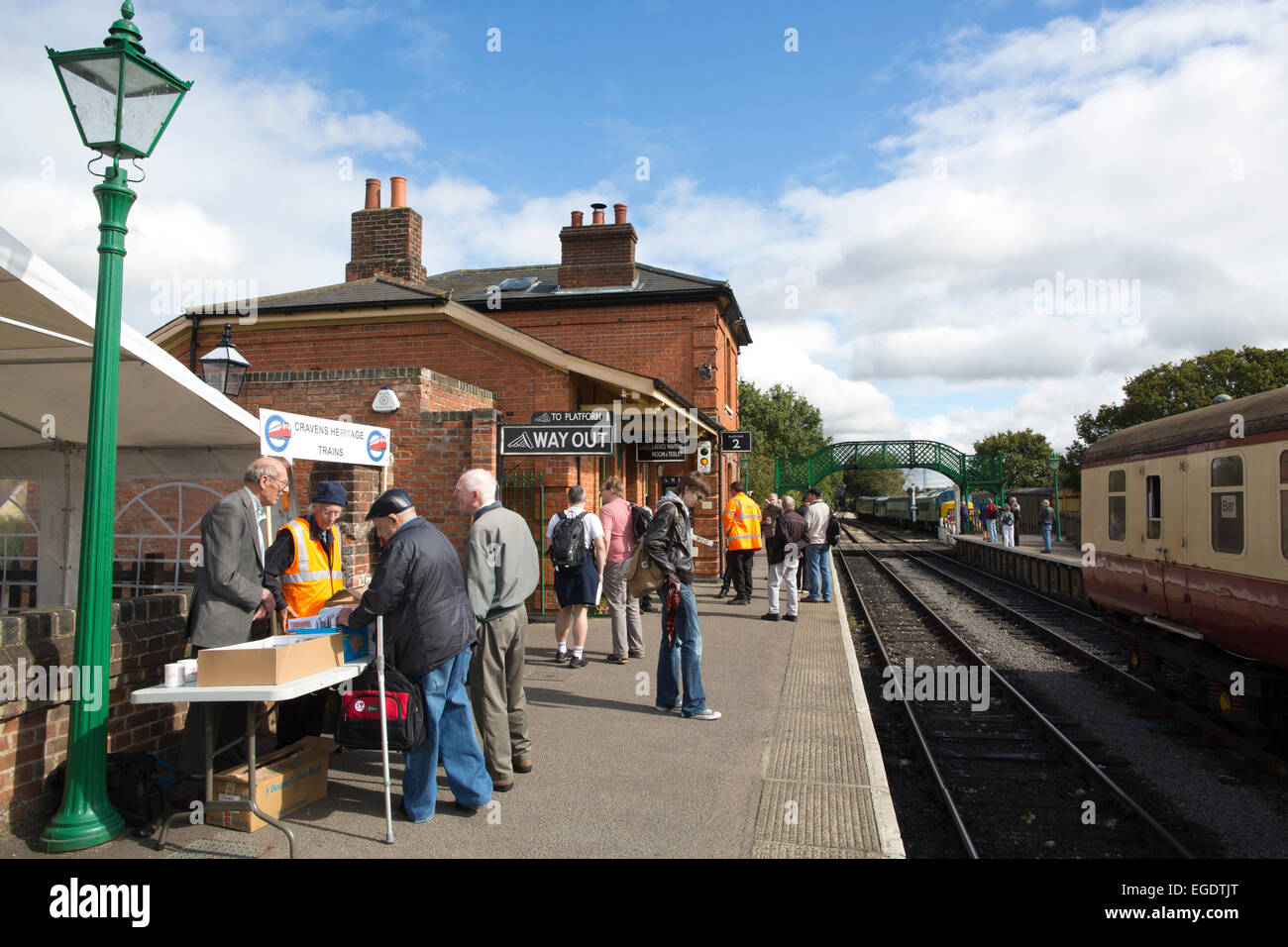 Cravens Heritage Tube train enthusiasts on the platform at North Weald Station, Epping Ongar Railway, Essex, England, UK Stock Photo