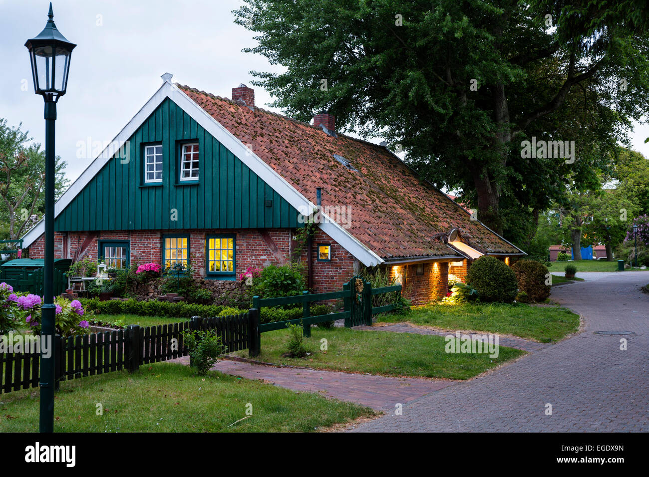 Old Island House in Spiekeroog at dusk, Spiekeroog Island, National Park, North Sea, East Frisian Islands, East Frisia, Lower Saxony, Germany, Europe Stock Photo