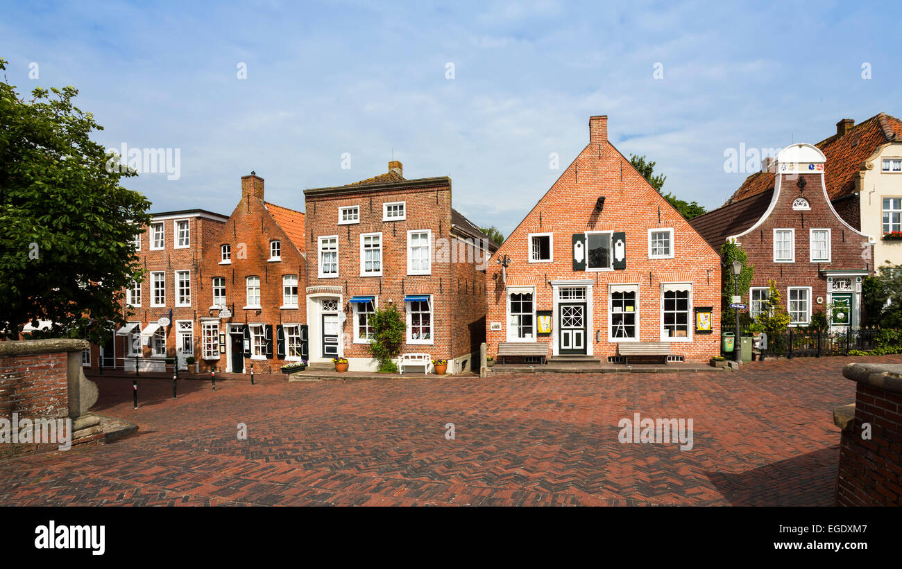Houses near the harbour of Greetsiel, Lower Saxony, Germany, Europe Stock Photo