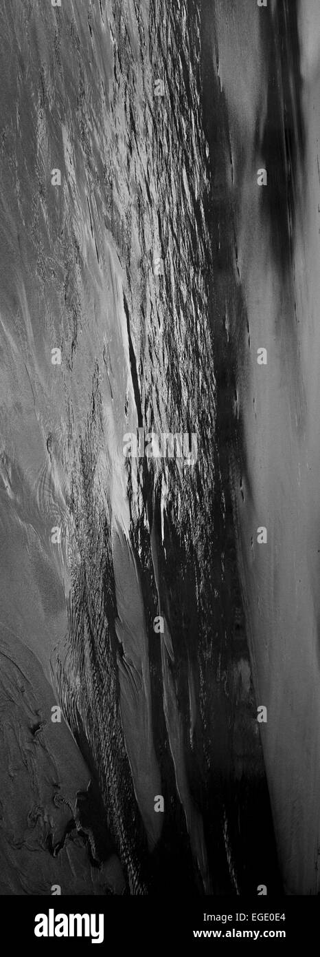 Black and white abstract, water on sand Stock Photo - Alamy
