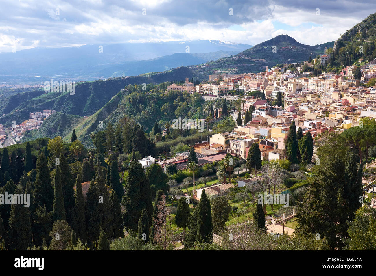 Taormina with Mount Etna in the distance, Sicily, Italy. Italian Tourism, Travel and Holiday Destination. Stock Photo