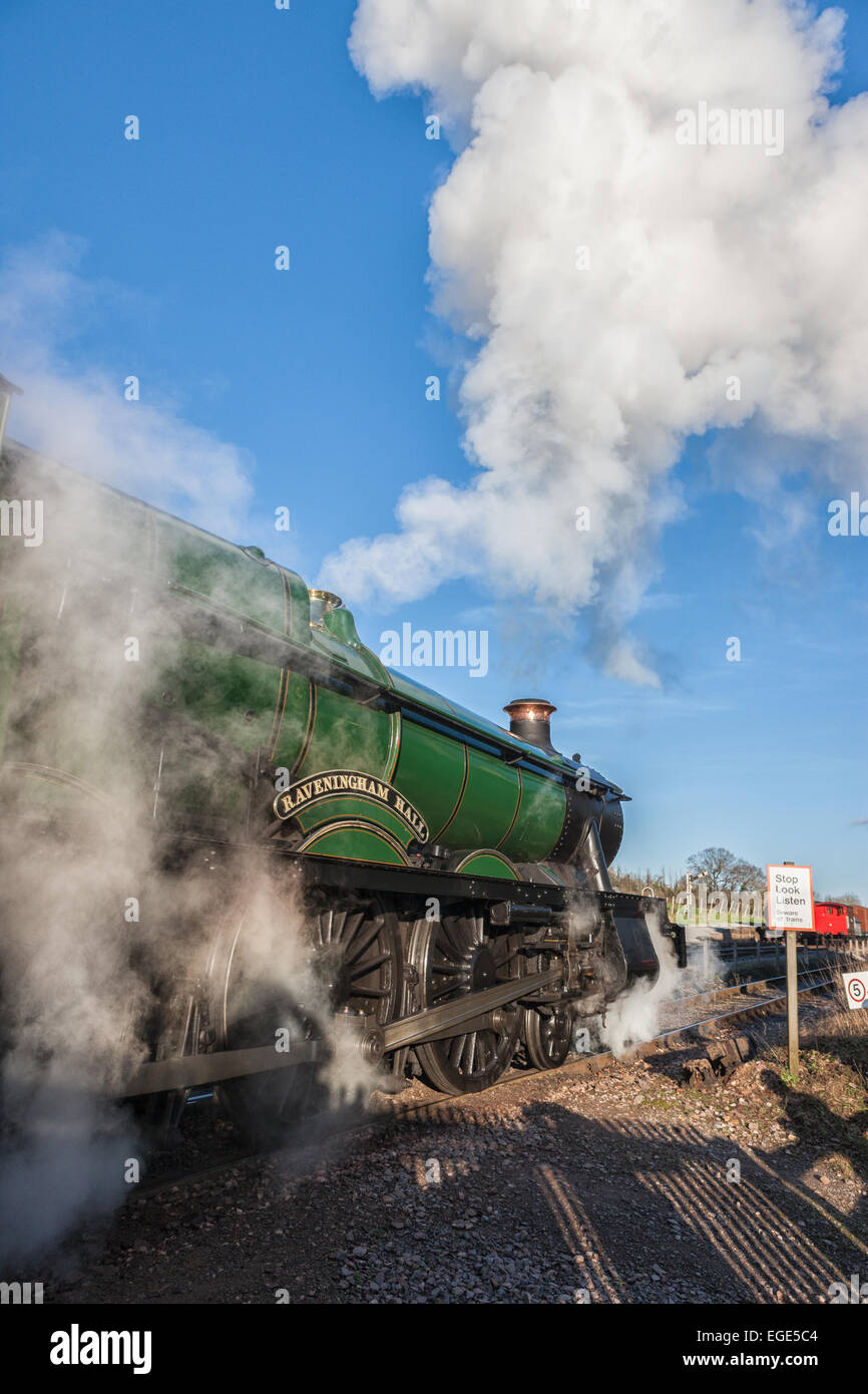 6960 GWR Hall Class - Raveningham Hall pulls out of Washford Station on a cold afternoon during the Winter Steam Gala Stock Photo