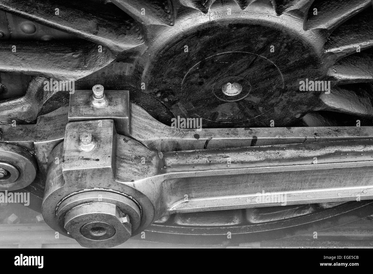 A close up of one of the main driving wheels and rods on GWR large prairie 4160 on a cold frosty morning at Bishops Lydeard. Stock Photo