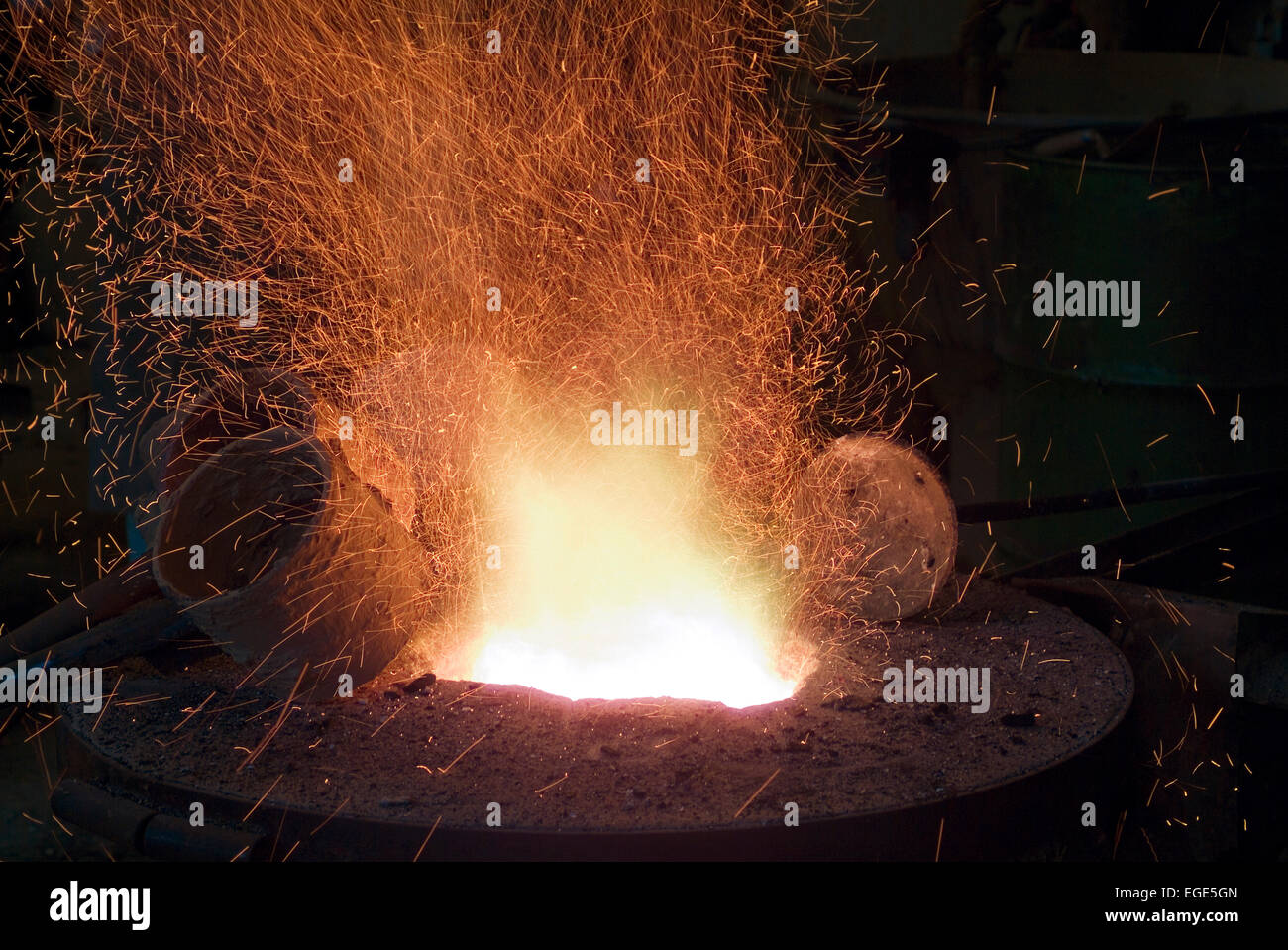 Bronze casting with sparks germany europe Stock Photo