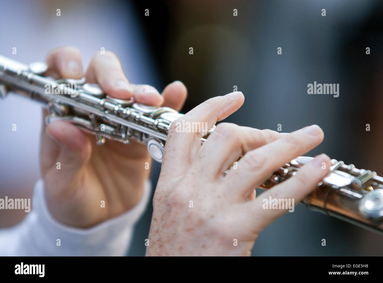 Hands playing flute Stock Photo Alamy