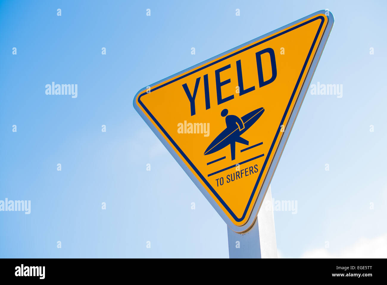 A yellow yield to surfer sign in southern California Stock Photo