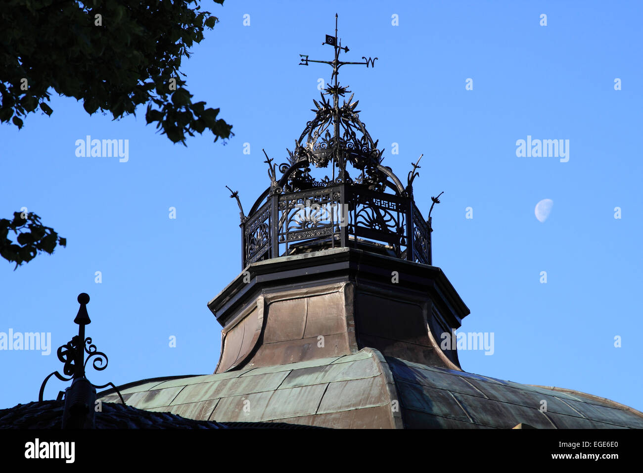 Elaborate rooftop detail of the Royal Pump Room against a cloudless sky with moon / Harrogate / North Yorkshire / UK Stock Photo