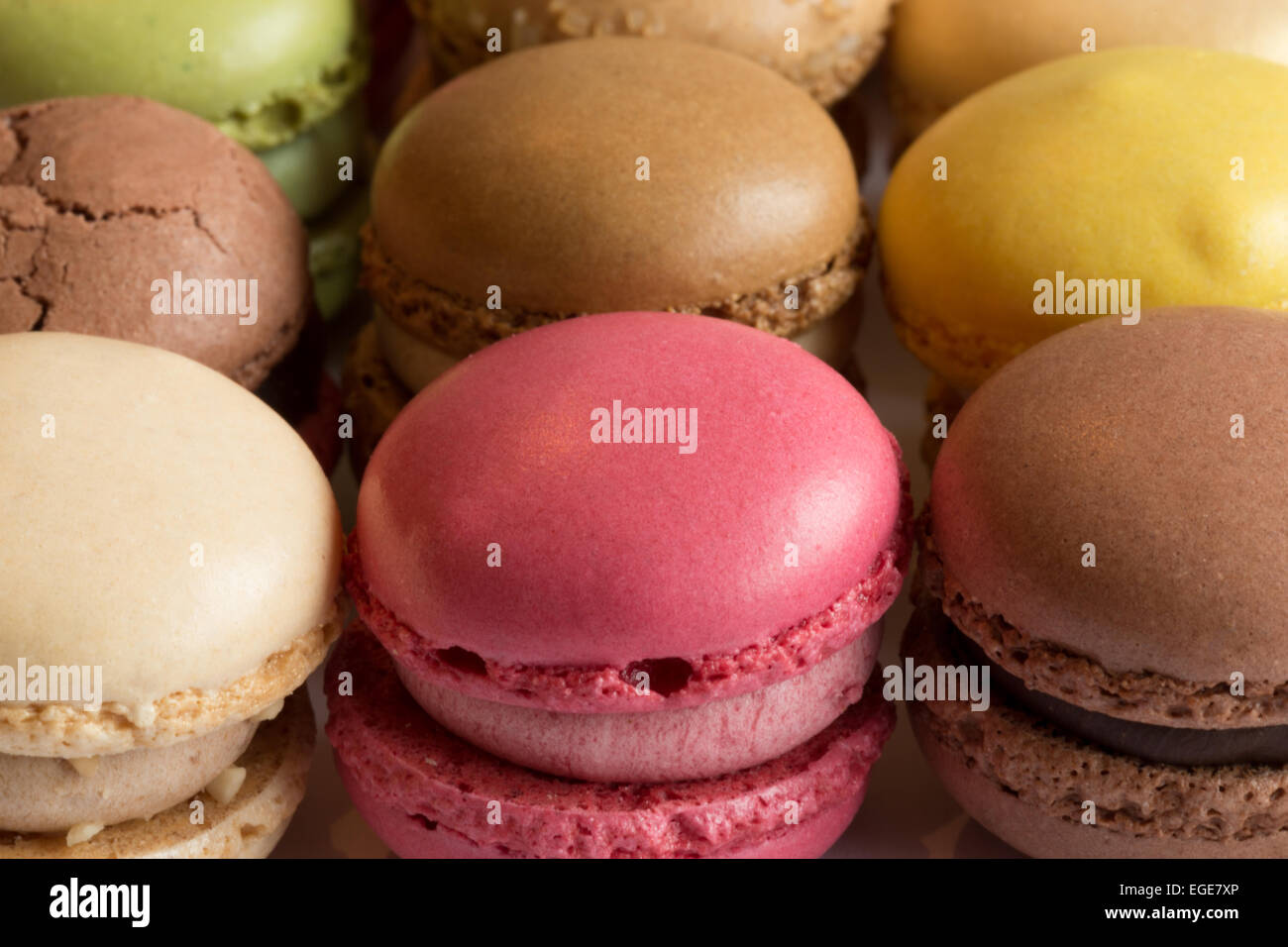 A close up photograph of some colorful Macaroons. A macaroon is a sweet