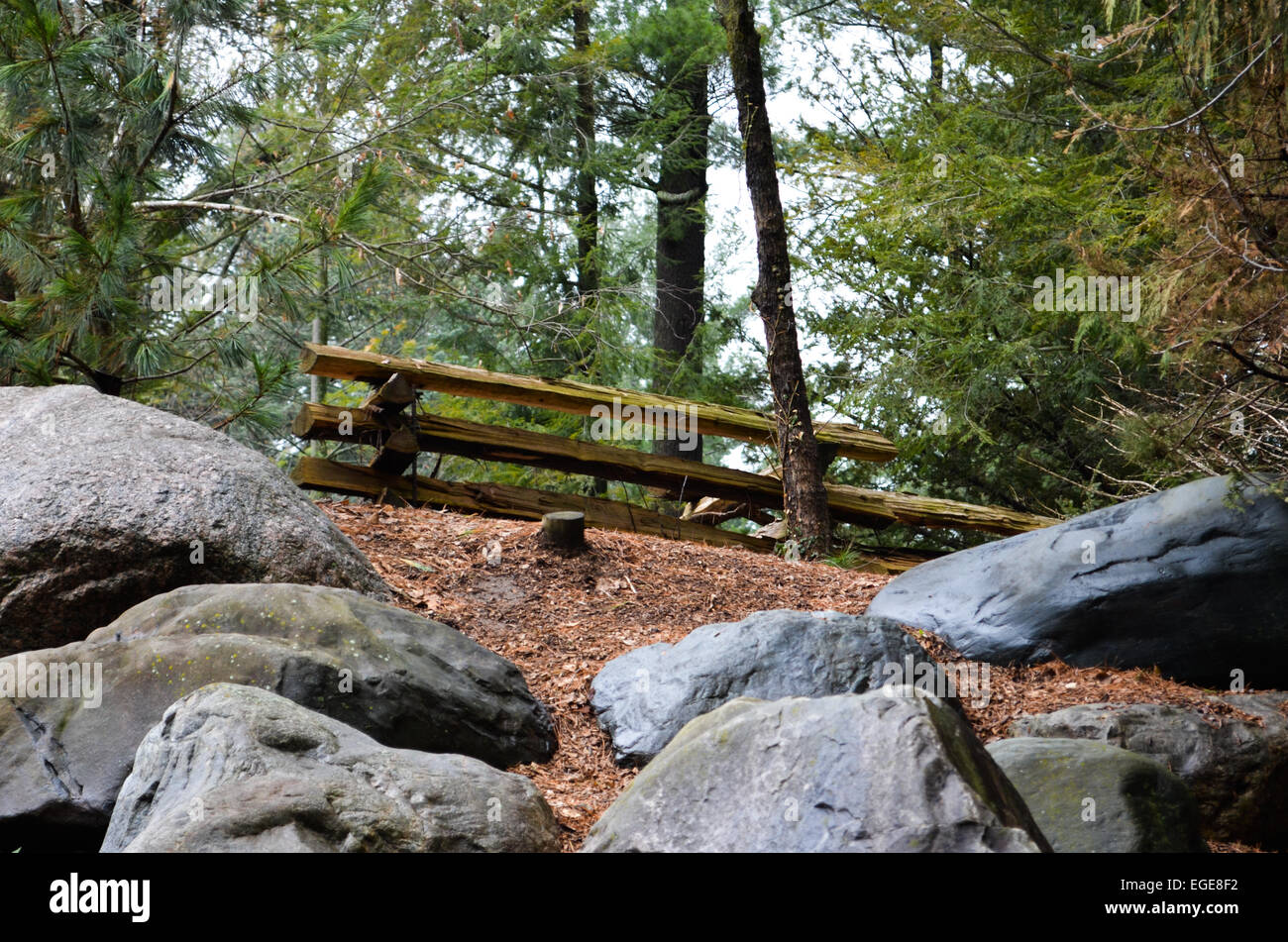 Fence Atop Boulders Stock Photo
