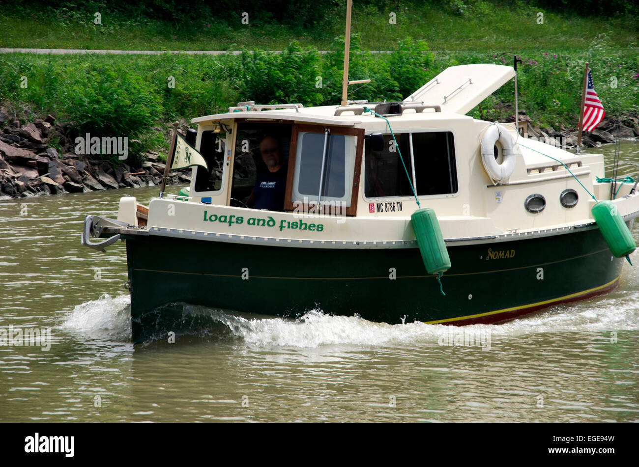 Tiny private canal boat travels on Erie Canal Stock Photo Alamy