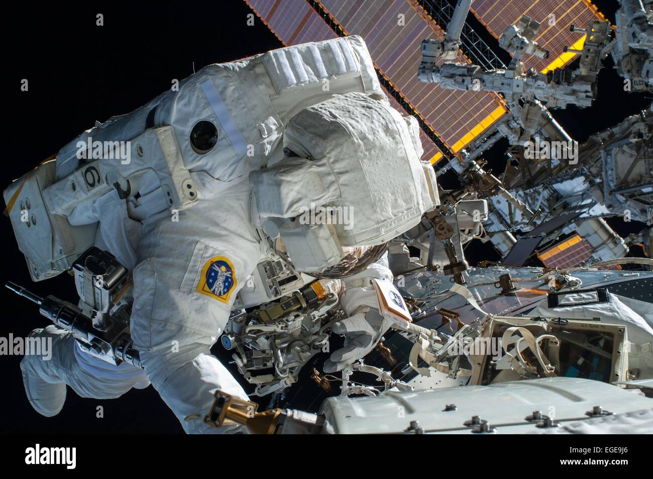 NASA astronaut Terry Virts Flight Engineer of Expedition 42 during a spacewalk to route cables on the ISS February 23, 2015 in Earth Orbit. Virts and fellow astronaut Barry Wilmore completed a 6-hour, 41-minute spacewalk routing more than 300 feet of cable as part of a reconfiguration of the International Space Station to enable U.S. commercial crew vehicles under development to dock to the space station in the coming years. Stock Photo