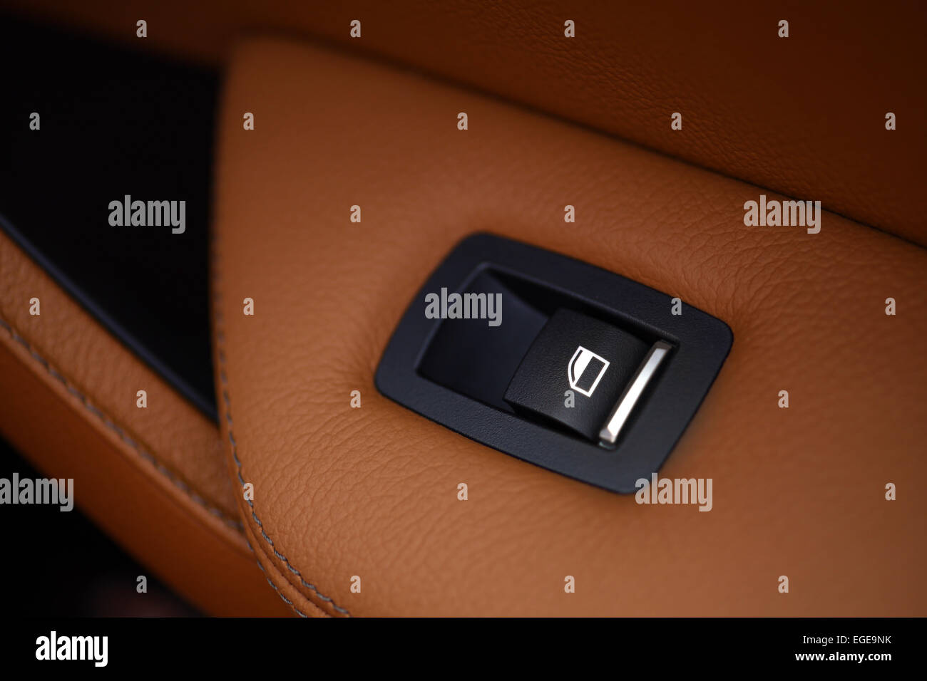 Detail on button controlling the window in a car Stock Photo - Alamy