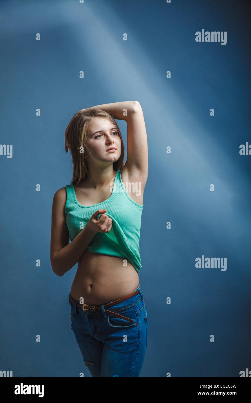 Woman in a blue shirt hi-res stock photography and images - Alamy