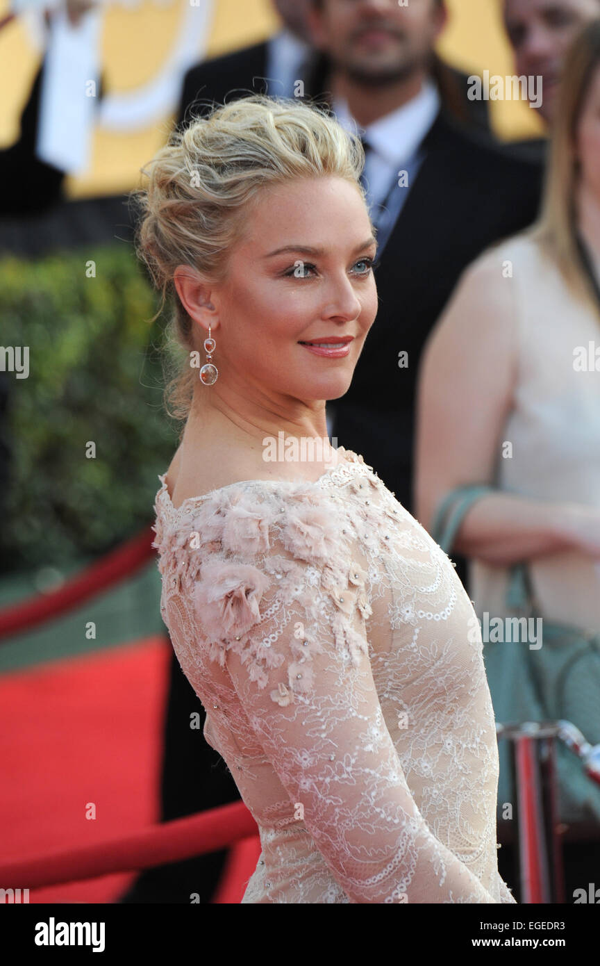 Beige dress lace long sleeves earrings hi-res stock photography and images  - Alamy