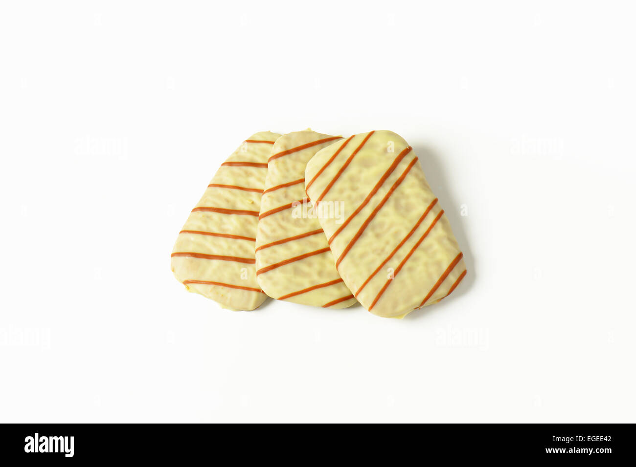 Thin butter biscuits covered in white chocolate Stock Photo