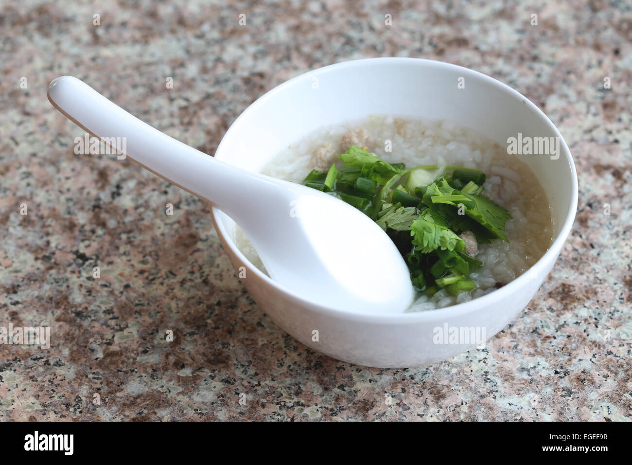 rice soup of Thai foods in the white cup. Stock Photo