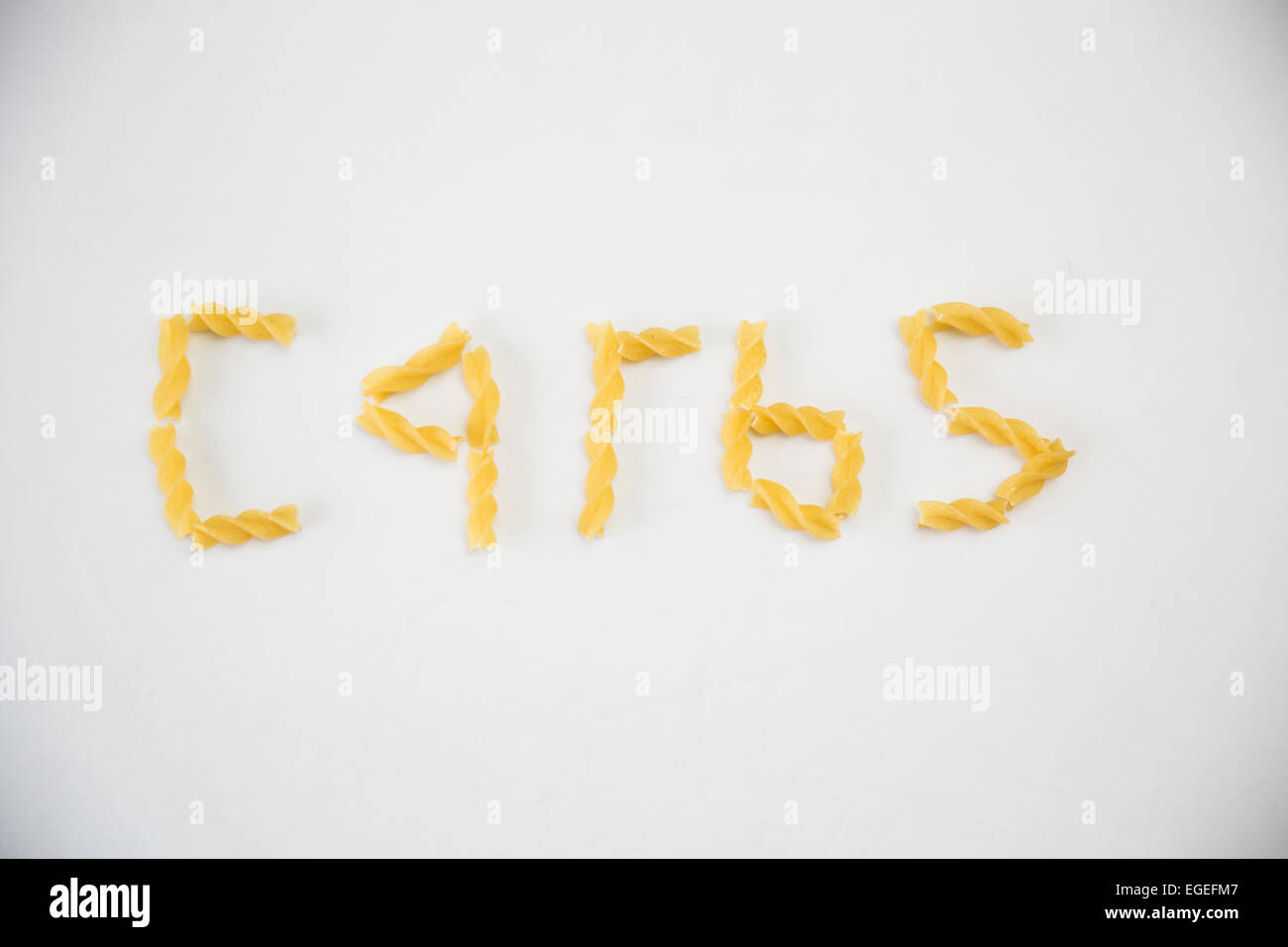 carbs written in pasta Stock Photo