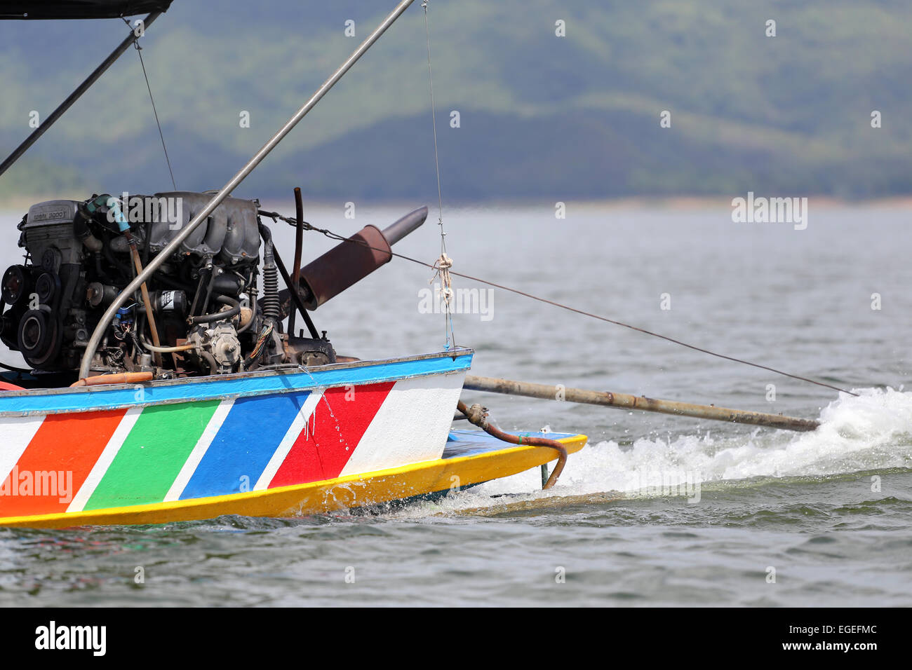 Outboard motor running on the local boat. Stock Photo