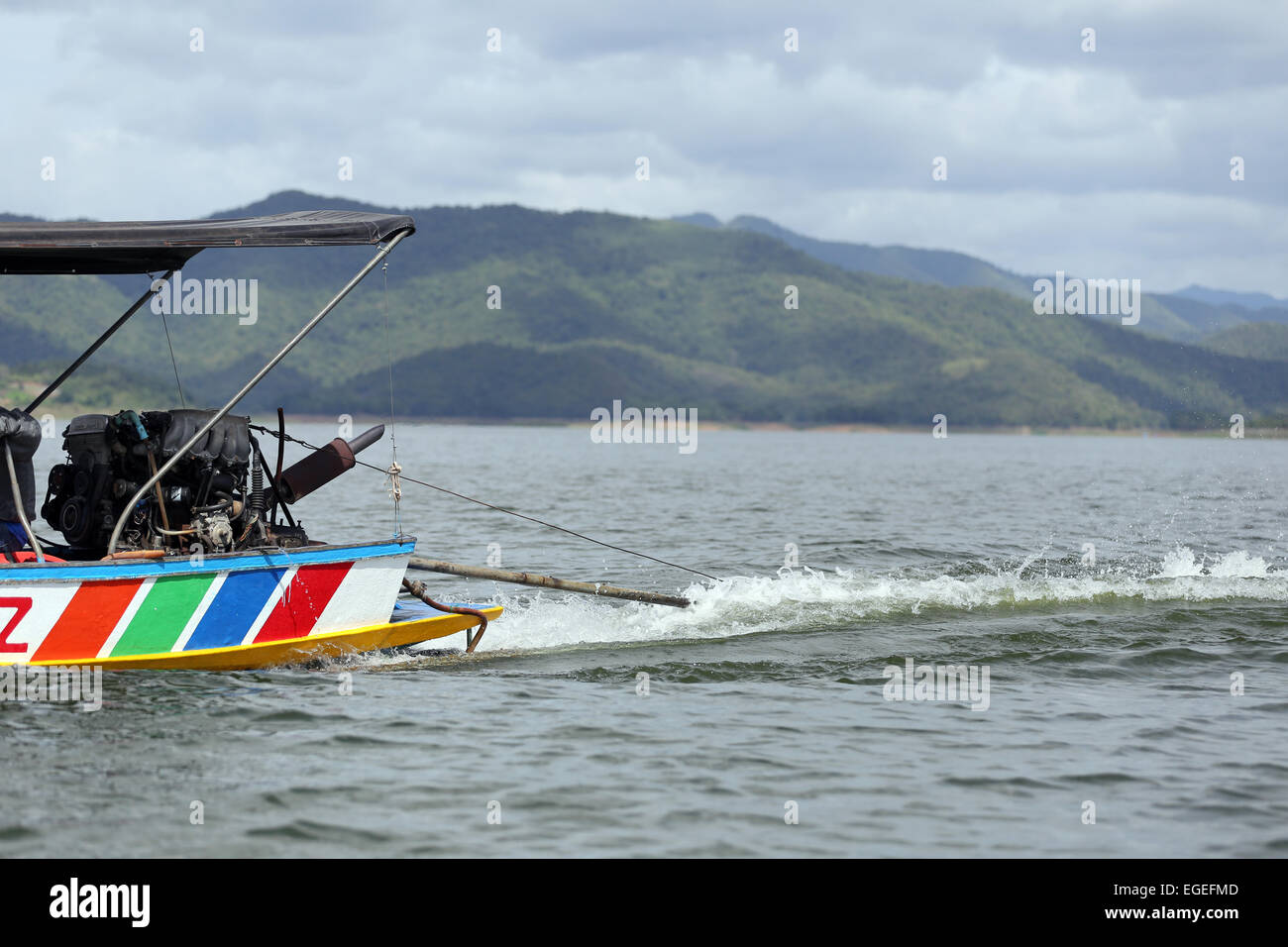Outboard motor running on the local boat. Stock Photo