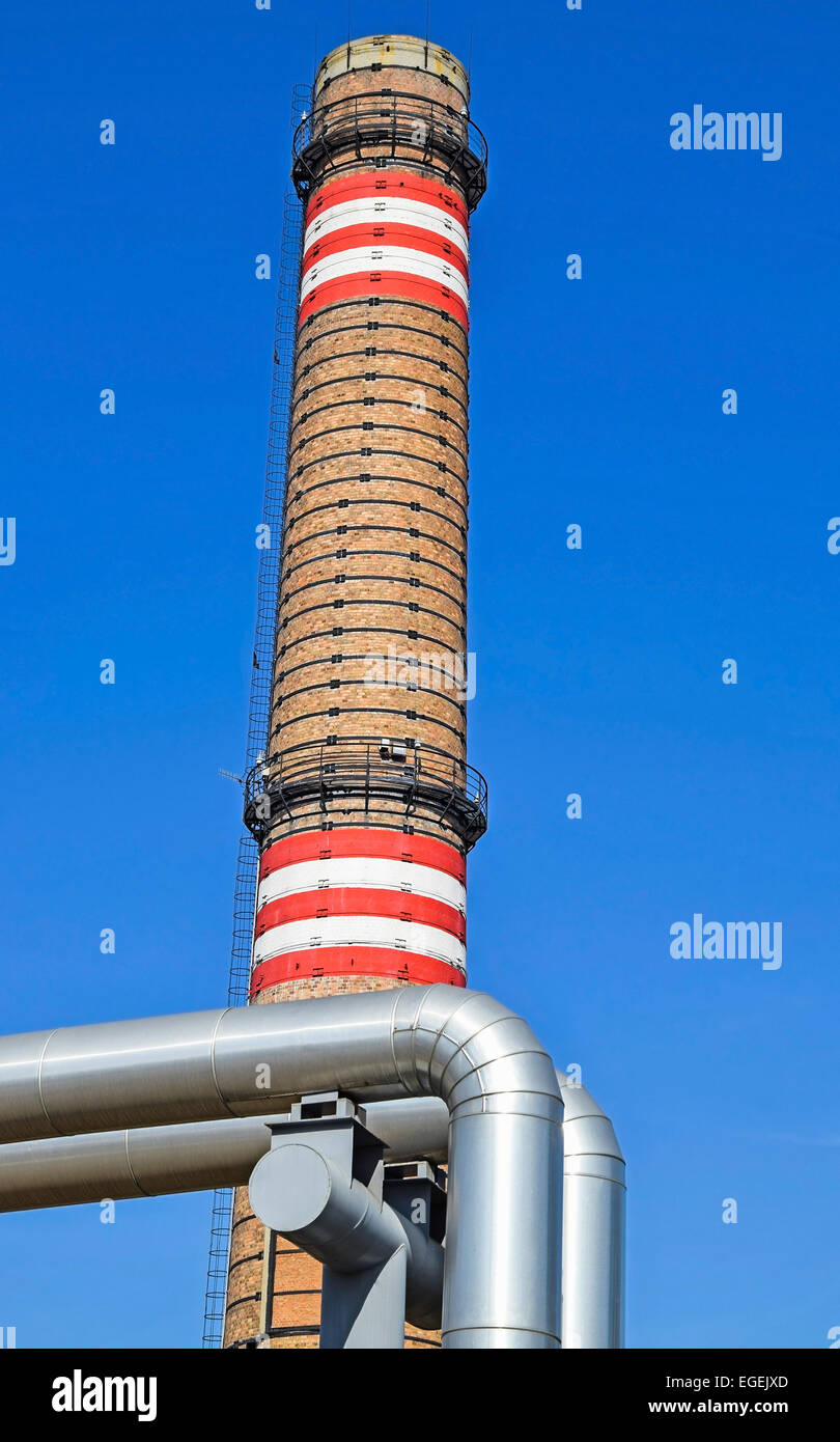 Pipes and smoke stack of the power station Stock Photo