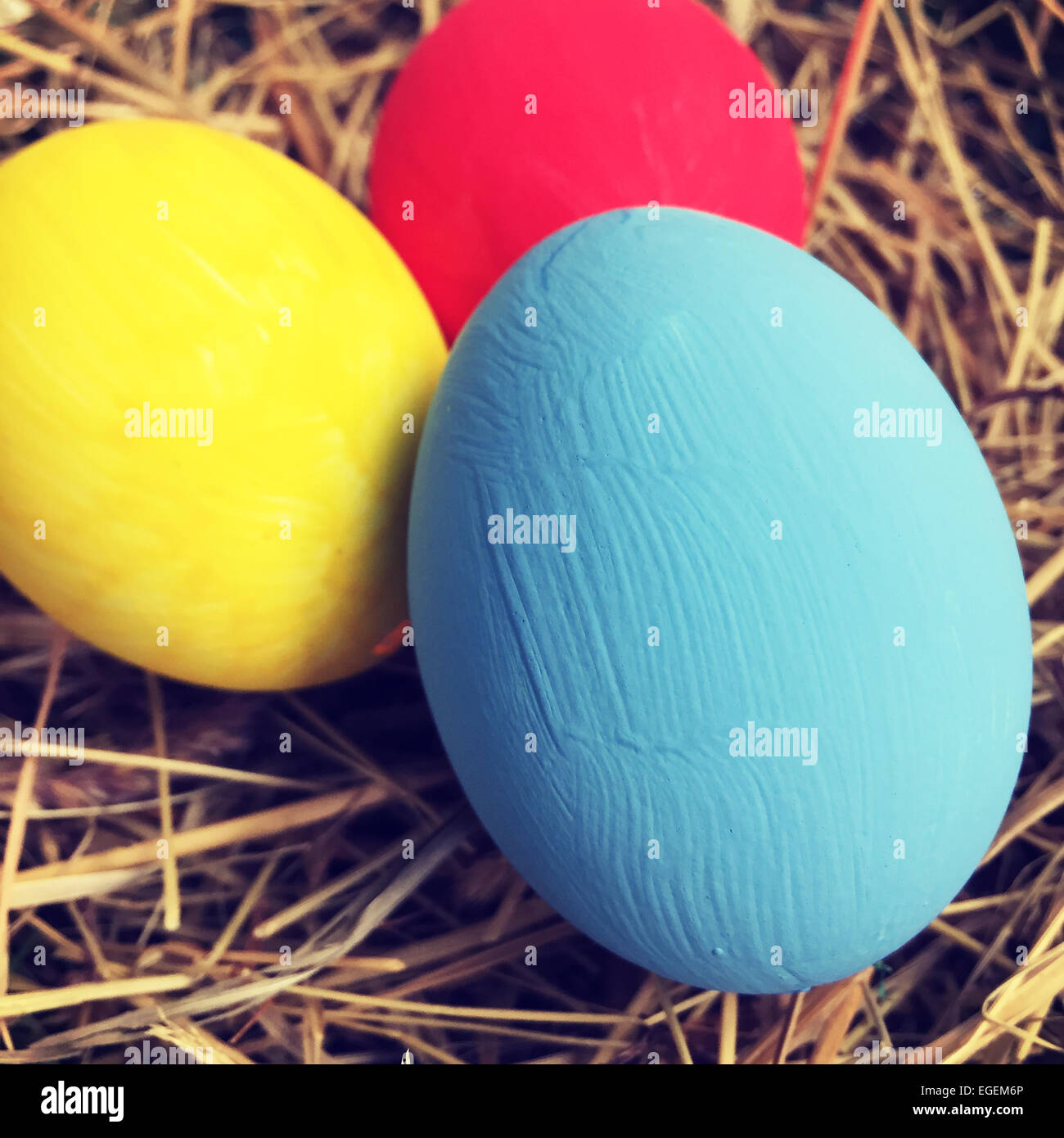 Colorful easter eggs in basket Stock Photo