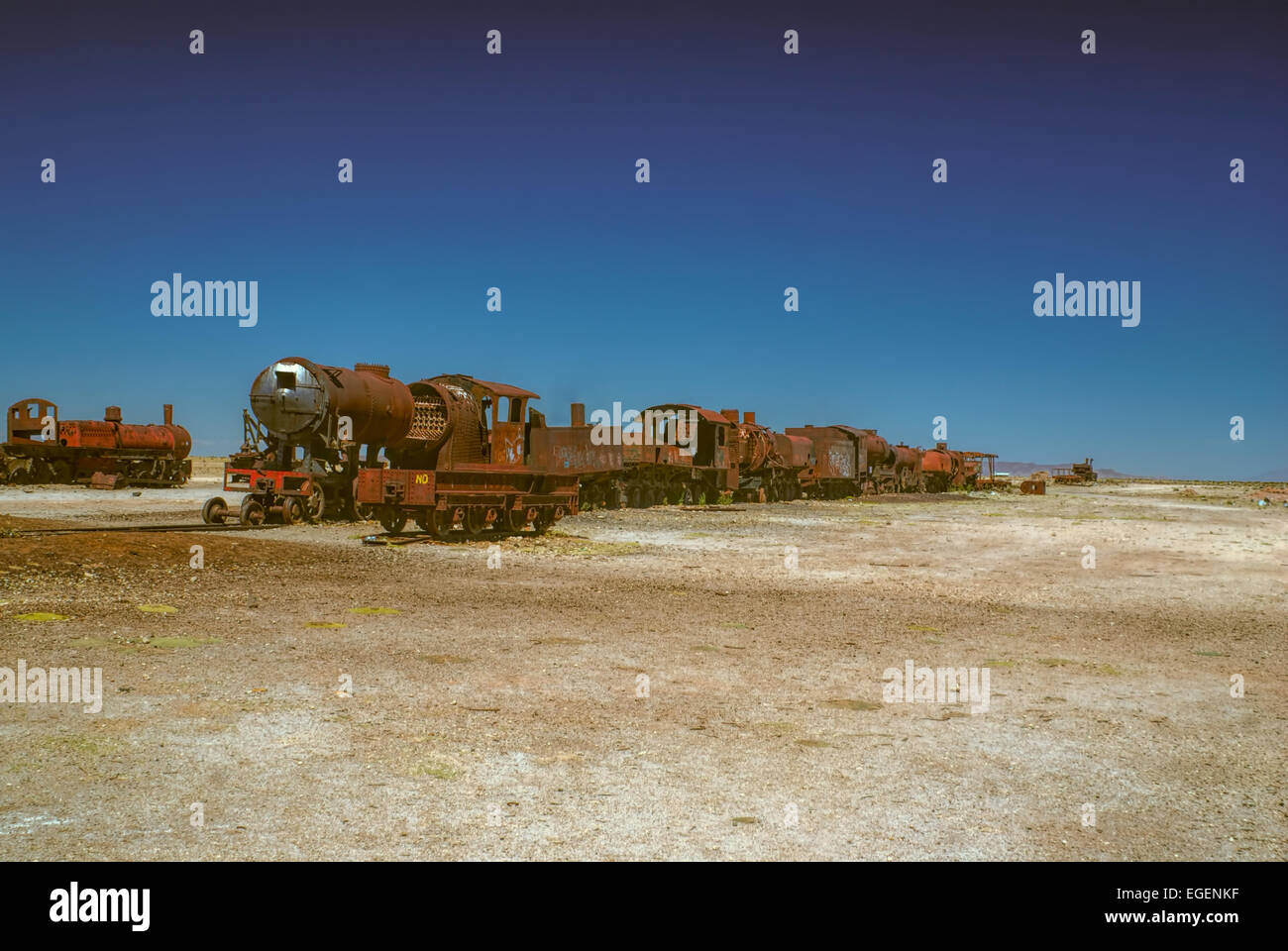 Old locomotive graveyard in desert near Salar de Uyuni in Bolivia Stock Photo