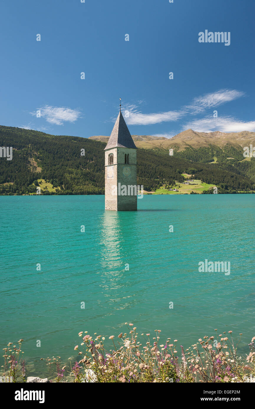 Steeple, bell tower of the submerged church of the village of Alt-Graun in Lake Reschen, or Reschensee Lake, Graun, Vinschgau Stock Photo