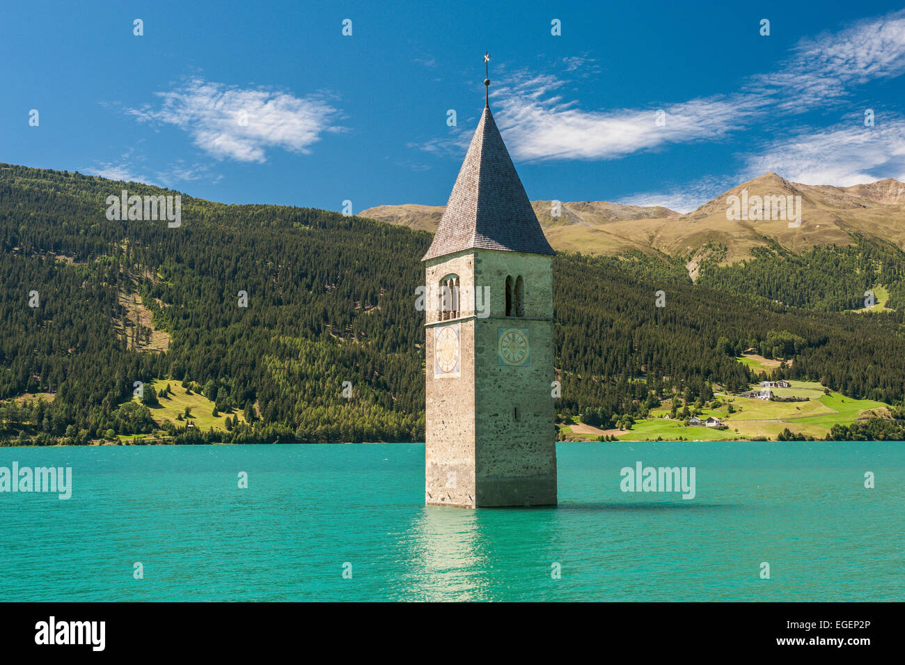 Steeple, bell tower of the submerged church of the village of Alt-Graun in Lake Reschen, or Reschensee Lake, Graun, Vinschgau Stock Photo