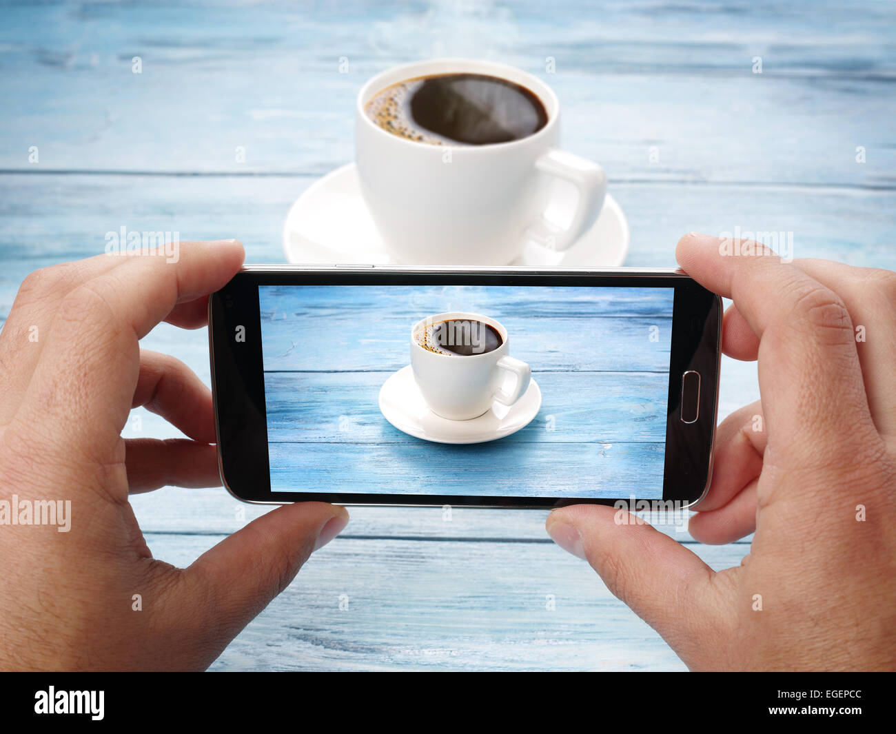 Taking photos with mobile phone.The latest technologies. Stock Photo