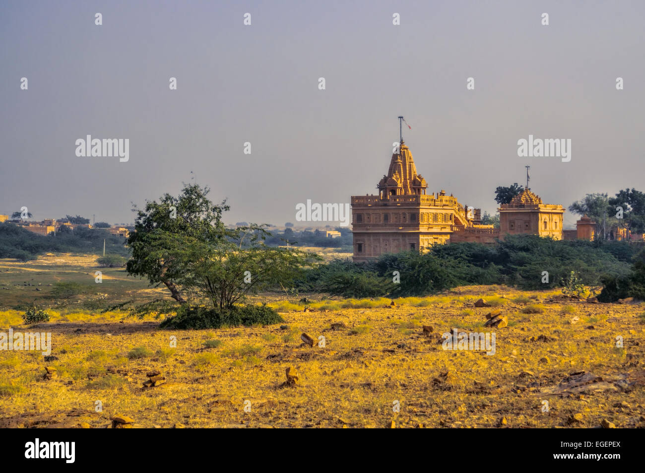 Picturesque view of houses in Thar Desert illuminated by the setting sun Stock Photo