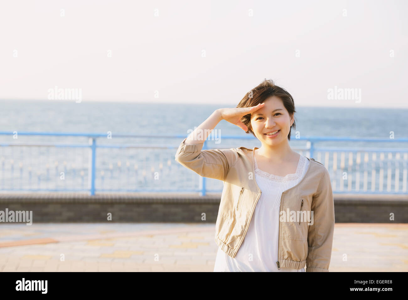 Young Japanese woman by the sea Stock Photo - Alamy