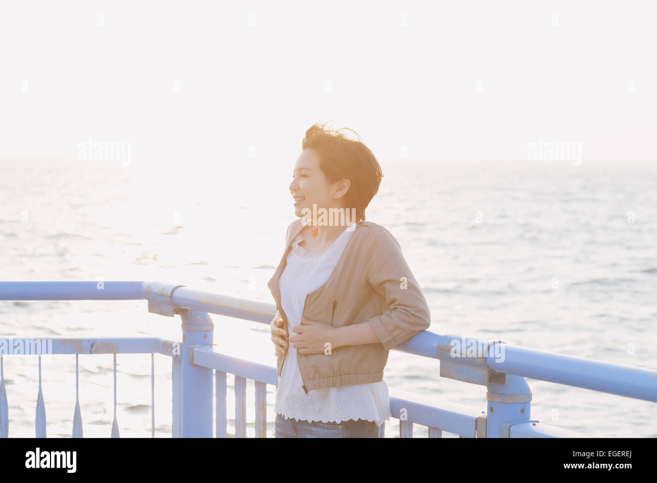 Young Japanese woman by the sea Stock Photo - Alamy