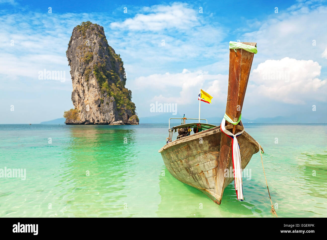 Old wooden boat on a tropical island. Stock Photo