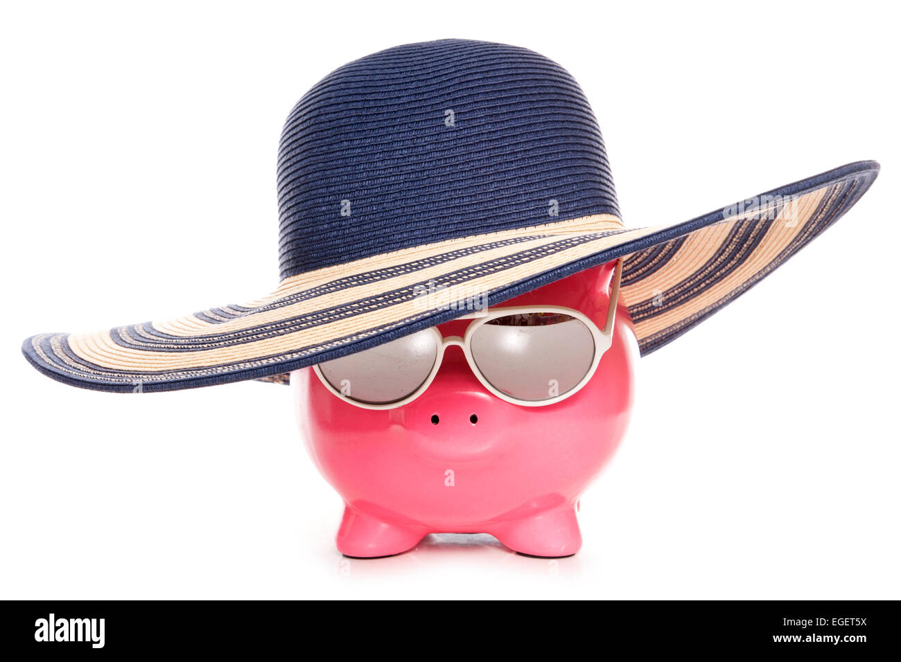 piggy bank wearing a summer hat cutout Stock Photo