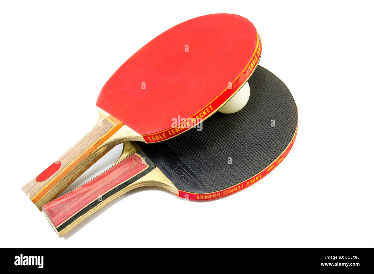 Royalty-Free photo: Two red-and-brown ping pong rackets