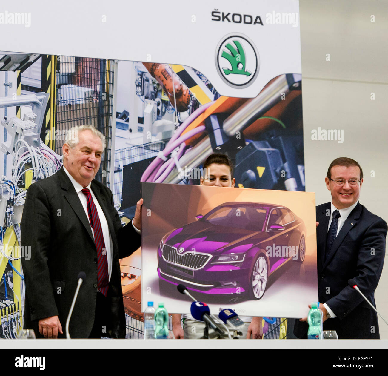 Kvasiny, Czech Republic. 20th Feb, 2015. Czech President Milos Zeman (left) receives design picture of third generation of Skoda Superb from Member of the Board of Management for Human Resources Management Bohdan Wojnar (right) in Skoda Auto factory in Kvasiny, Czech Republic, on Friday, February 20, 2015. © David Tanecek/CTK Photo/Alamy Live News Stock Photo