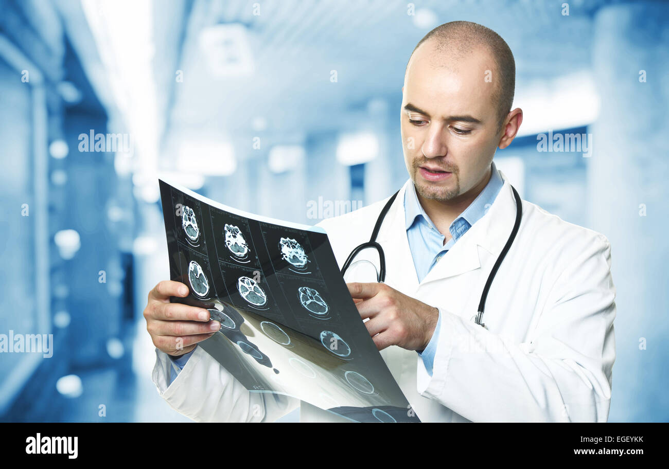 portrait of caucasian doctor check xray Stock Photo