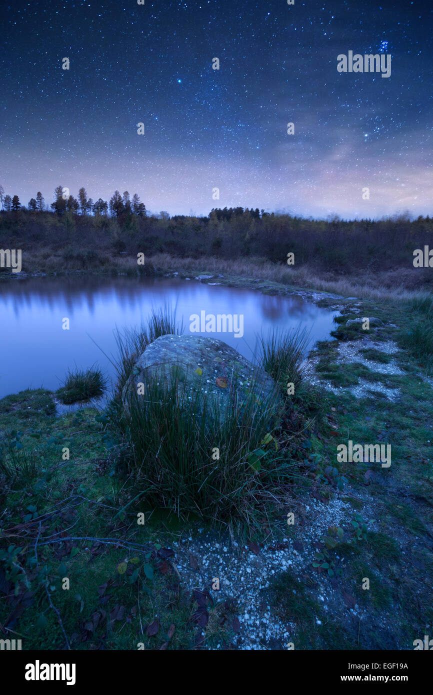 Stars at night over a Welsh heathland landscape. Stock Photo