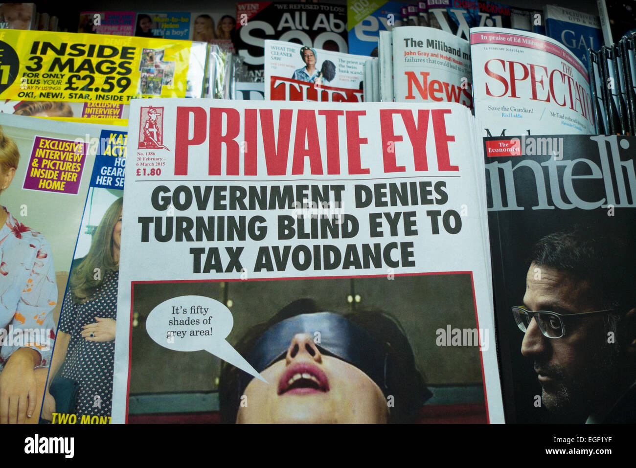 Front cover of Private Eye Magazine Tax Avoidance and Fifty Shades of Grey reference newsagent shelf February - March 2015 London England UK Stock Photo