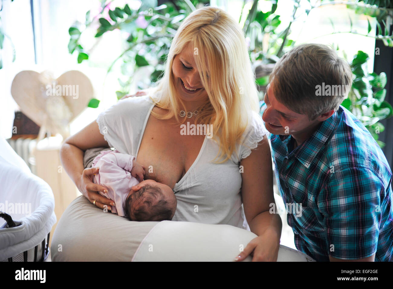 mom breastfeeding dad